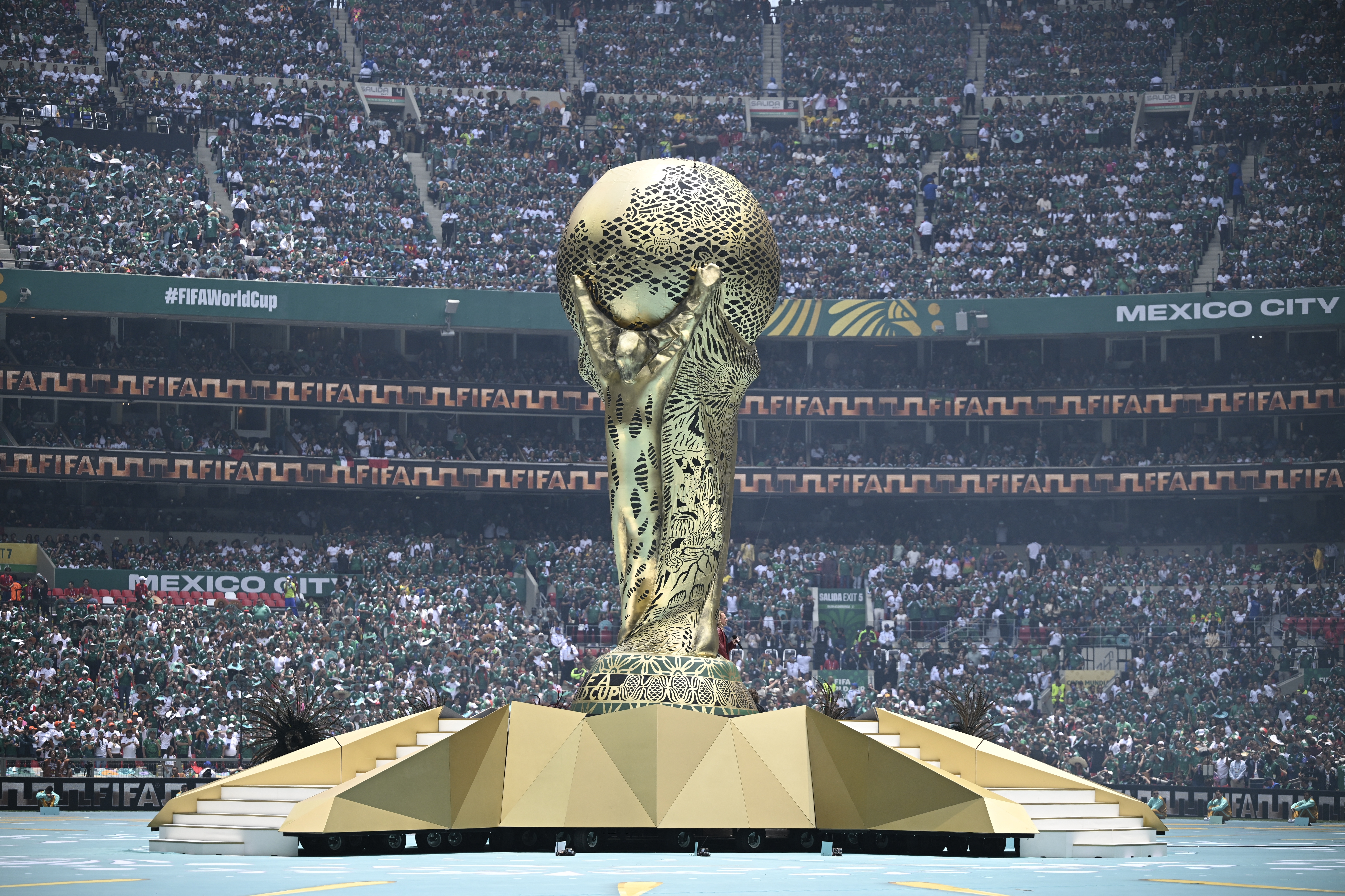 A huge replica of the World Cup trophy is seen during the opening ceremony ahead of the 2026 World Cup Group A football match between Mexico and South Africa at the Mexico City Stadium in Mexico City on June 11, 2026.
Alfredo ESTRELLA / AFP