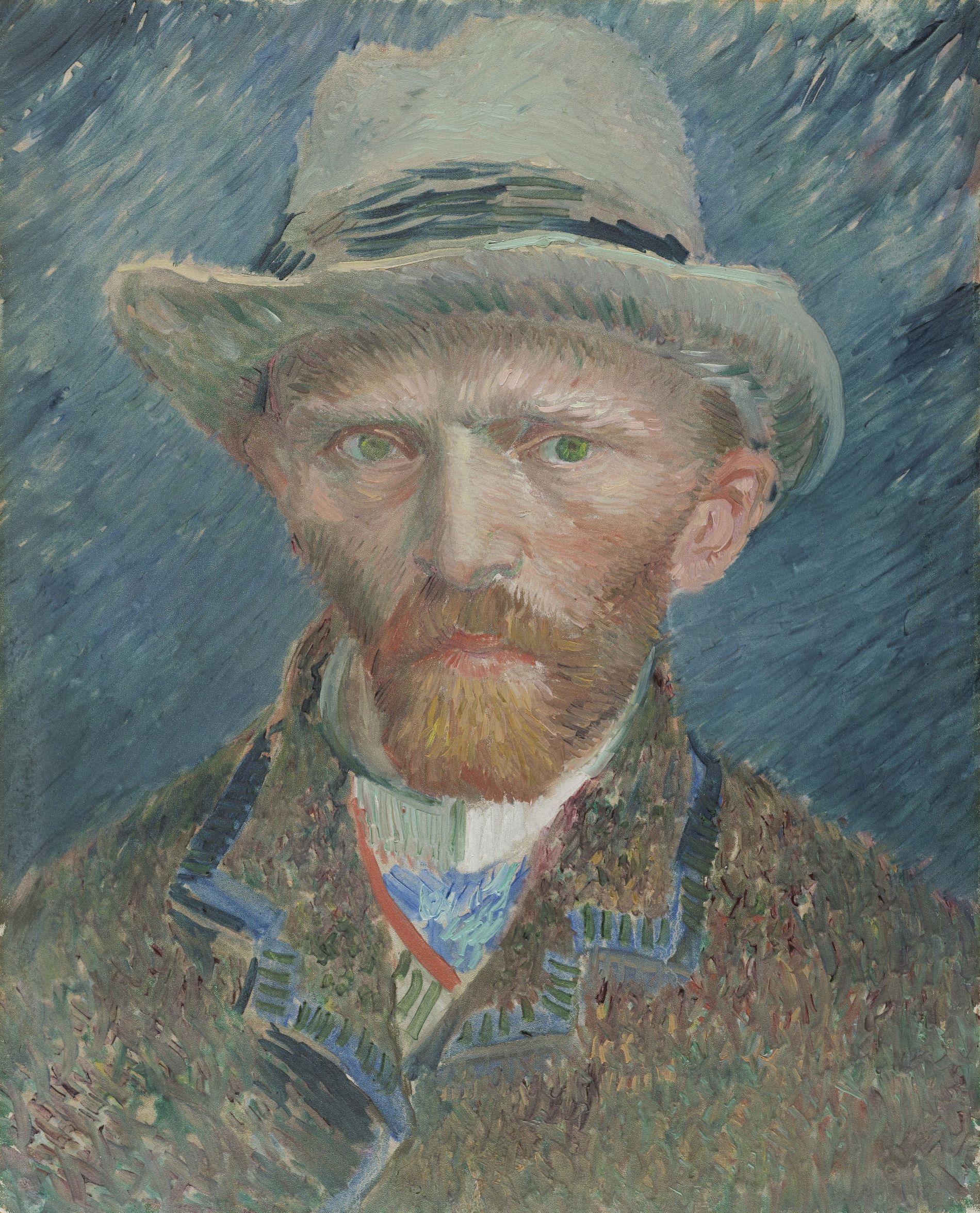 Zelfportret van Vincent van Gogh in zijn klassieke stijl met veel kleine streepjes. De kleuren zijn vrij somber, veel blauw- en bruintinten. Hij kijkt bedenkelijk naar rechts en draagt een beige hoed.