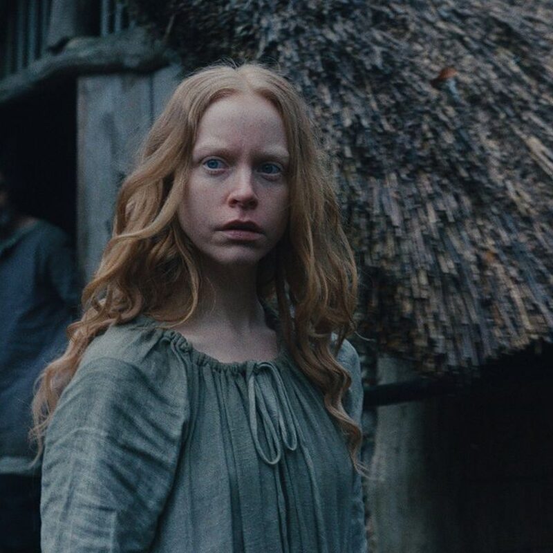 Vrouw in middeleeuws dorp