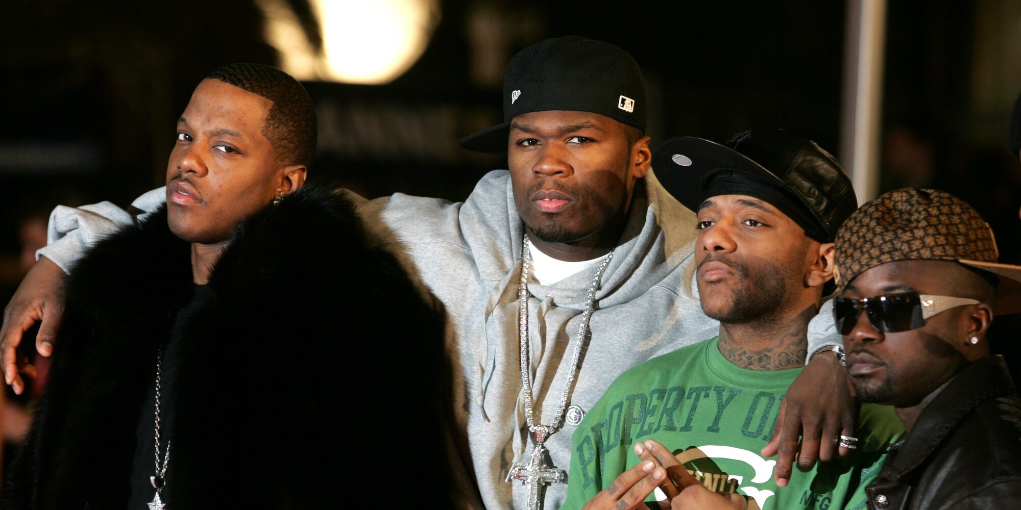US rapper 50 Cent pose with guests as he arrives at the Palais des Festival in Cannes, southern France, 21 January 2006 to attend the 2006 NRJ Music Awards. AFP PHOTO/GERARD JULIEN